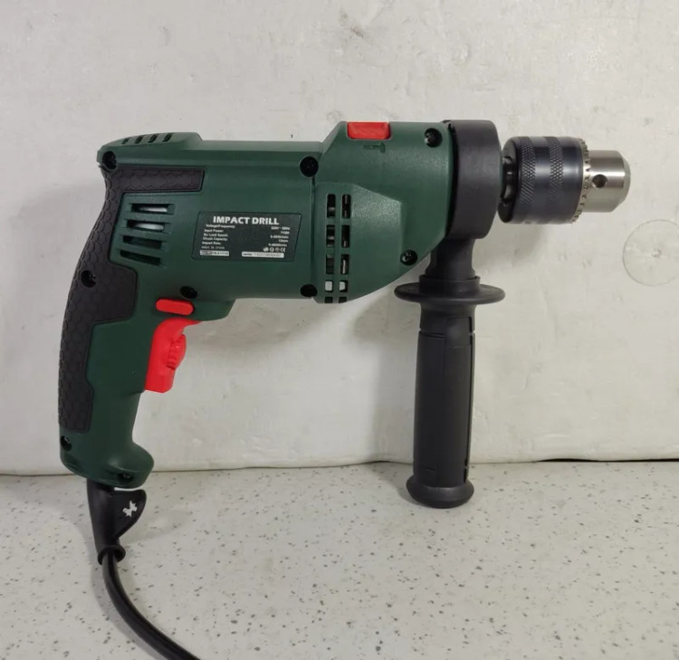 دریل برقی چکشی ۷۱۰ وات دیمردار تولیکس مدل TX-21710 با کارت گارانتی یکساله